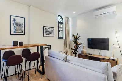a living room with a couch and a table at GuestReady - A secret passage in Porto in Porto