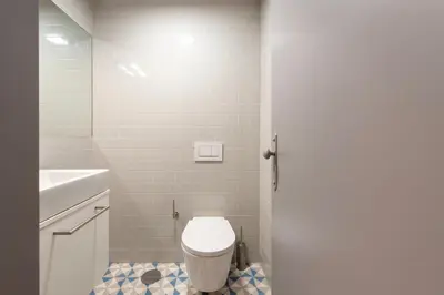a bedroom with two beds with towels on them at Cedofeita's Blue House in Porto