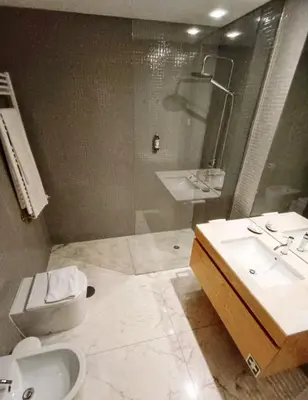 a bathroom with a toilet and a sink and a shower at BO - Aníbal Cunha in Porto