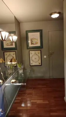 a room with a glass table with a lamp on it at Praceta in Porto