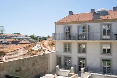 a view of a building with a roof at Host Wise - Fervença Boutique Palace in Vila Nova de Gaia