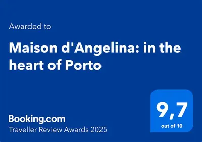a blue sign with the words malcolm dangilina in the heart at Maison d'Angelina: in the heart of Porto in Porto