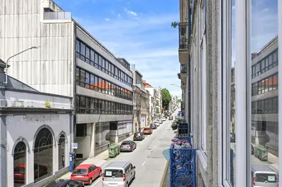 a view of a city street with cars parked at Oporto Sunset Blue Balcony in Porto