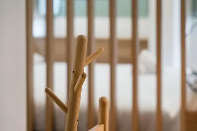 a wooden fence with a bunch of wooden sticks at GuestReady - A modern stay in Downtown in Porto