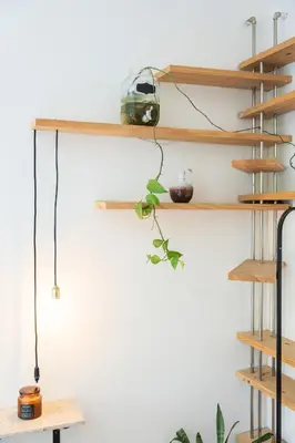 a room with wooden shelves on the wall at Jardim do Morro Apartment By Porto Stories in Vila Nova de Gaia