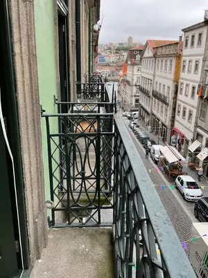 a view of a city street from a balcony at São João Boutique Apartment in Porto