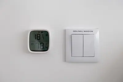 an alarm clock next to a clock on a wall at Urban Loft in Porto