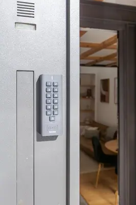 a close up of a door with a remote control at Urban Loft in Porto