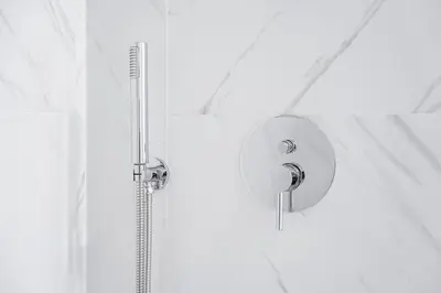 a shower with a shower head in a bathroom at GuestReady - Downtown Refuge with Private Parking in Porto