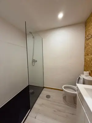 a bathroom with a shower and a toilet at Porto Encanto- 7 Bedrooms in Porto