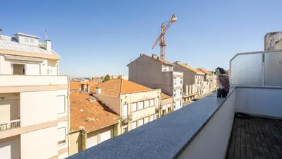 a view from a balcony of buildings at Capelo Residency by LovelyStay in Porto
