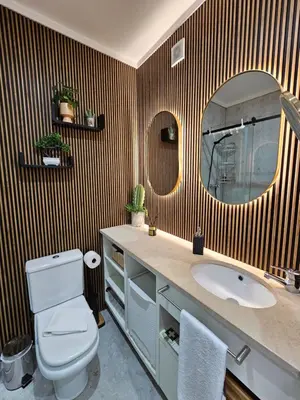 a bathroom with a sink and a mirror at Porto Central Terrace Apartment in Porto