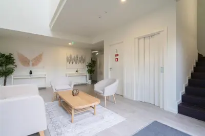 a living room with a couch and a table at Host Wise - Central Private Flats - Terrace in Porto