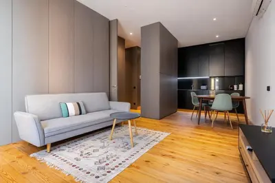 a living room with a couch and a table at Dream on - Flow in Porto