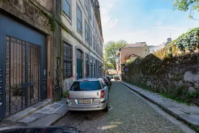 a car parked on the side of a street at Cedofeita Studio - Your Porto Escape in Porto