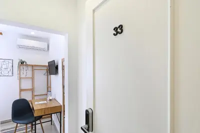 a door leading into a room with a desk at Casa Maya in Porto