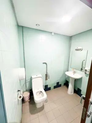 a bathroom with a toilet and a sink at Fantasy Hostel Porto in Porto