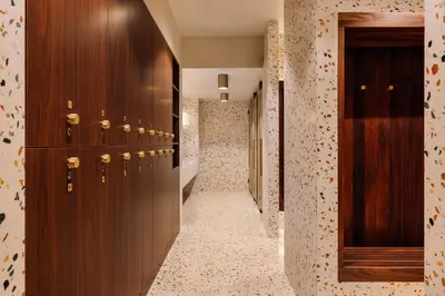 a hallway with wooden lockers in a locker room at Altis Porto Hotel, a member of Preferred Hotels & Resorts- LVX in Porto