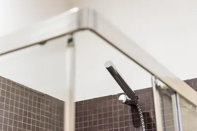 a view of a shower in a bathroom at GuestReady - Sunny terrace in downtown Porto in Porto