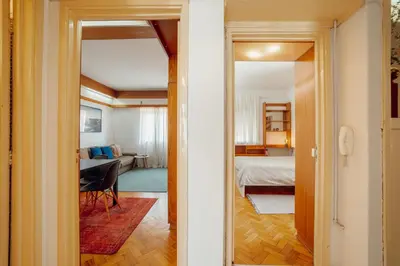 a hallway leading to a room with a bedroom at Downtown Classic With Terrace by Vacationy in Porto