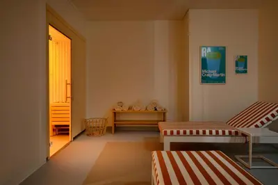 a living room with two chairs and a table at Vila Catarina Luxury Apartments in Porto
