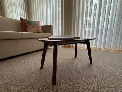 a coffee table in a living room with a couch at Lit Apartments - CLÉRIGOS in Porto