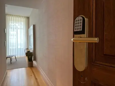 a door with a remote control in a room at Lit Apartments - CLÉRIGOS in Porto