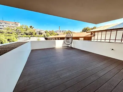 an empty balcony with a fan on it at Bombarda 250 E in Porto