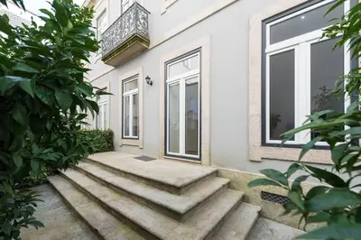 a set of stairs leading up to a house at Apartment Alegria Street by Sweet Porto - Free Parking in Porto