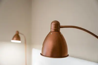 a brown lamp sitting on top of a table at GuestReady - Central Porto Gem in Porto