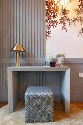 a desk with a lamp and a stool under it at 42 2 F Historical apartment at Cardosas Block in Porto