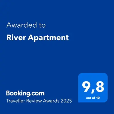 a blue screen with the text awarded to river apartment at River Apartment in Porto
