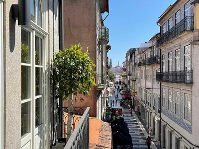a view of an alley with people walking down the street at Essência Portuense Studios in Porto