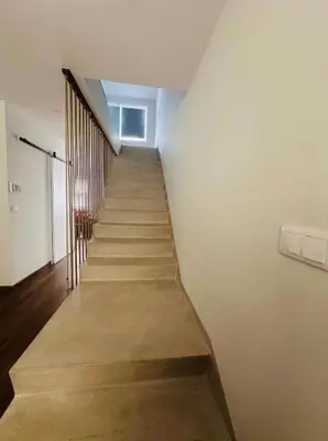 a stairway in a building with a stair case at Bridge Apartment in Porto