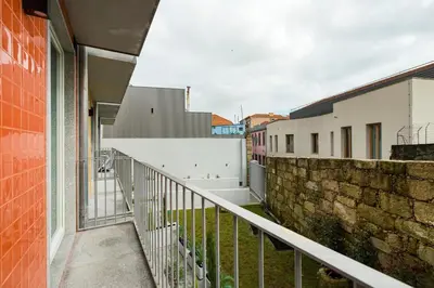 an external view of a balcony of a building at GuestReady - Trendy getaway in the heart of Porto in Porto