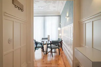 a dining room with a table and chairs at HM Loios charming loft in Porto