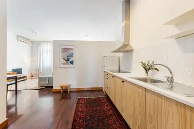a kitchen with a sink and a counter top at Hey Apartments B in Porto