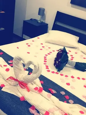 a bed with hearts on it with a cake on it at Estudio Metro heroismo in Porto
