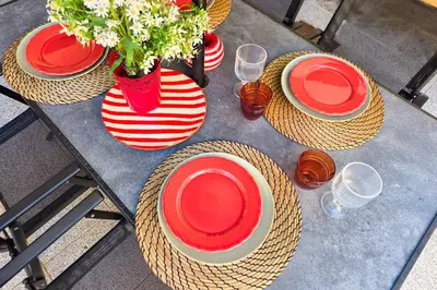a picnic table with two chairs and a table and a fence at Patio House - 2 Bedroom flat - Pet Friendly in Porto