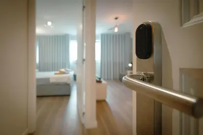 a room with a room with a bed and a hallway at The Cale - Antero de Quental - 12 in Porto