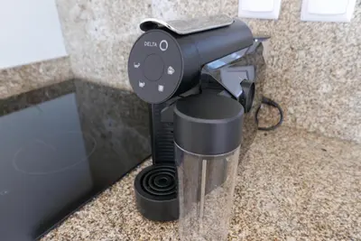 a black coffee maker sitting on a counter at Breiner Apartment, Arts District in Porto