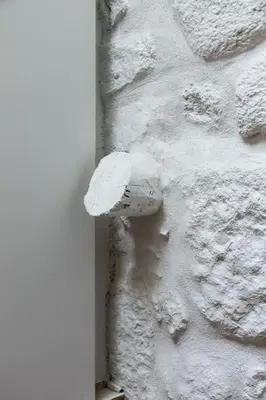 a white object on the side of a wall at Wood & Blue House - Porto in Porto