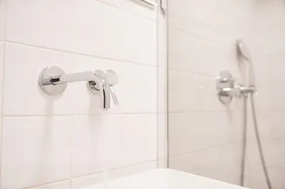 a bathroom with a shower and a sink at GuestReady - Oporto Vintage in Porto