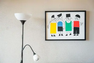 a picture of a group of people on a wall at GuestReady - A charming duplex home near Boavista in Porto