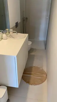 a bathroom with a sink and a toilet at VIVA Formosa Lofts in Porto