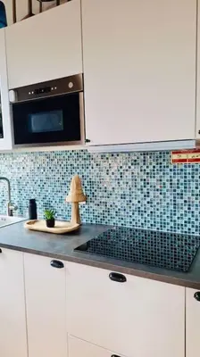 a kitchen with a counter top with a toy on it at Charming 2BR w Terrace & Garden in Porto