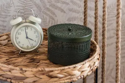 a clock sitting on top of a wicker basket with a basket at GuestReady - Industrial stay in downtown Porto in Porto