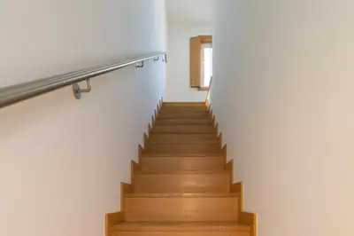 a staircase in a house with wooden floors at Host Wise - Elegant Home in the Heart of Porto in Porto