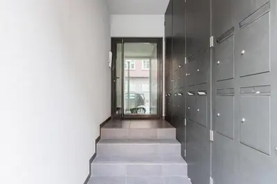 a bathroom with a toilet and a sink and a shower at Paraíso City Stay I in Porto