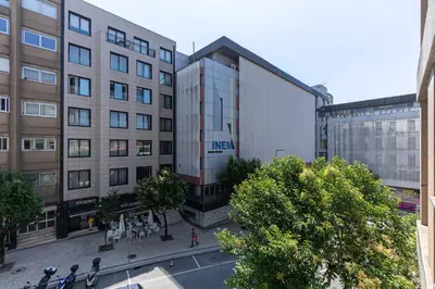 an aerial view of a building in a city at Now Trindade in Porto